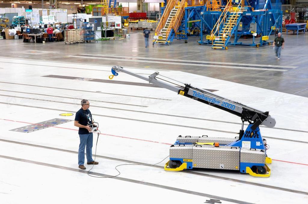 Boeing Images Boeing Worker with Robotic Handler