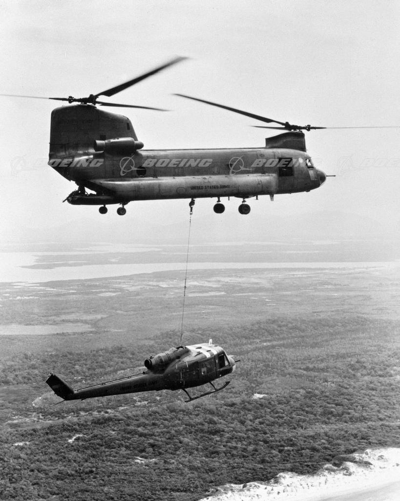 Boeing Images - Ch-47a Chinook Helicopter Transports Damaged Huey